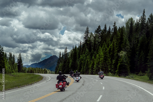 mountain bike trail in mountains, guys riding their bike in canada nature