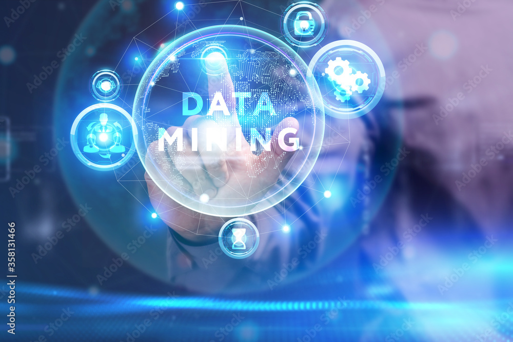Business, Technology, Internet and network concept. Young businessman working on a virtual screen of the future and sees the inscription: Data mining Business, Technology, Internet and network concept. Young businessman working on a virtual screen of the future and sees the inscription: Data mining