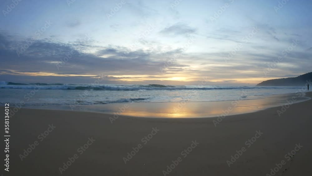sea wave water hit sand beach , reflection in water, cloudy sky with sunset background sea wave water hit sand beach , reflection in water, cloudy sky with sunset background