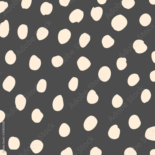 Vector geometric textured irregular black dot pattern with grunge sketchy dot on white background. Simple doodle background. Surface pattern design.
