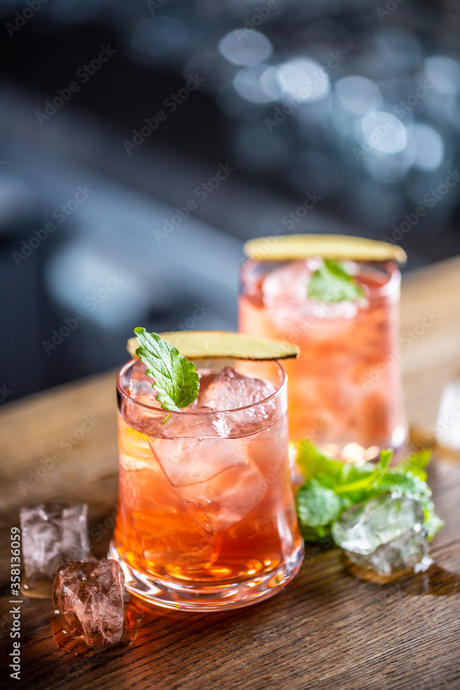 Vodka and cranberry in two glasses on a bar Vodka and cranberry in two glasses on a bar