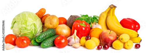 Fresh vegetables and fruits on white background. Banner of heap organic food
