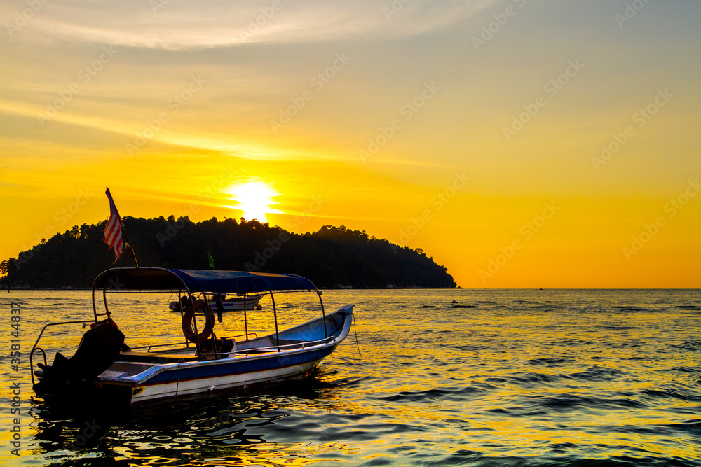 Sunset landscape with boats, Pangkor island, Malaysia