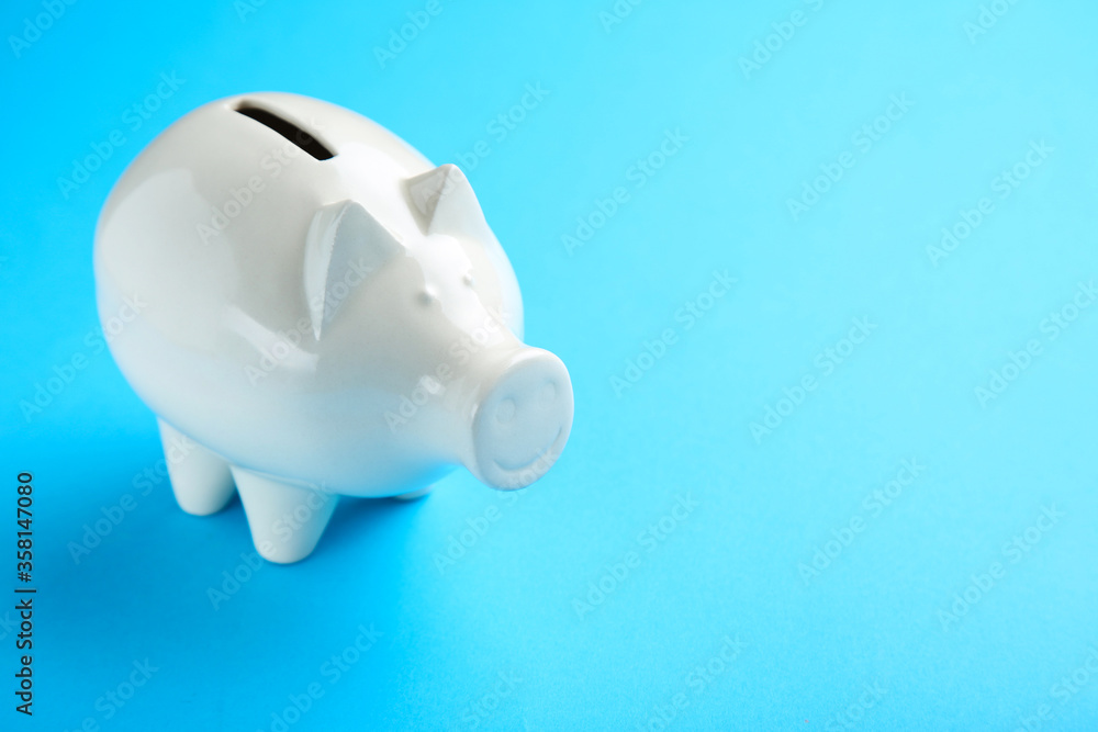Piggybank on blue background Piggybank on blue background