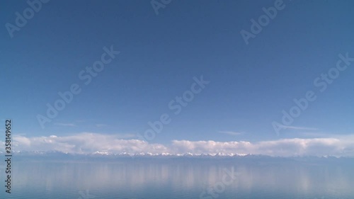 Kyrgyzstan Issyk-kul lake. Landscapes with cows.