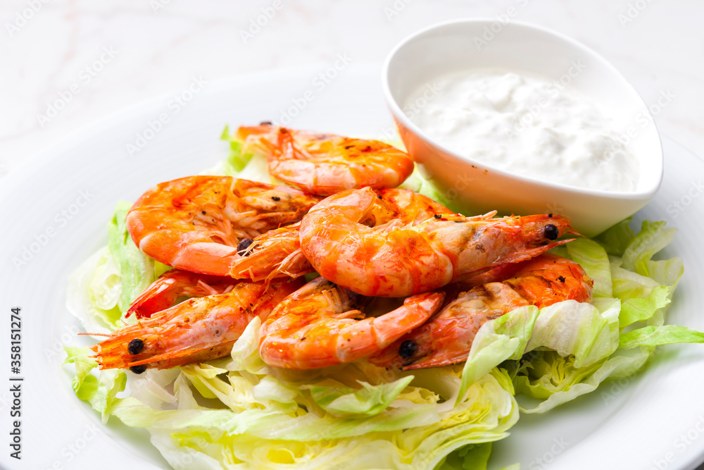 still lfe of grilled shrimps with garlic dip still lfe of grilled shrimps with garlic dip