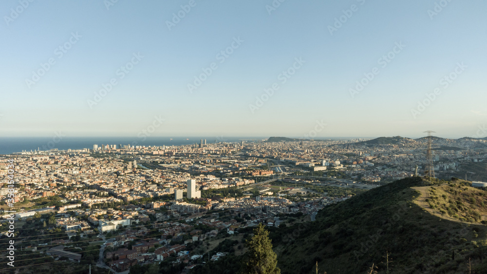 Panoramic view of Barcelona. Made from the Iberian town of Puig Castellar. Sunny day without any cloud in the sky.