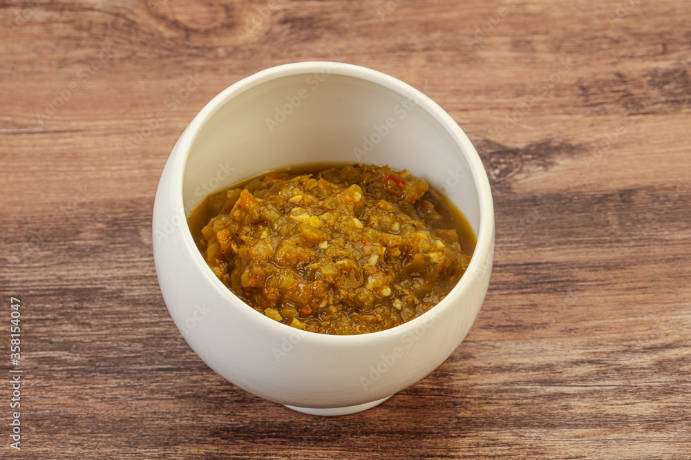 Green spicy sauce in the bowl Green spicy sauce in the bowl
