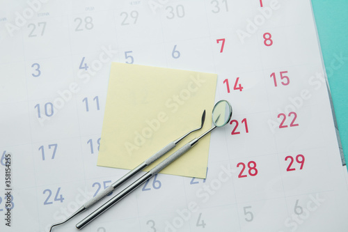 Wallpaper Mural Dental Hygiene and Health concept. Reminder dentist appointment in calendar and professional dental tools. Space for text. Torontodigital.ca