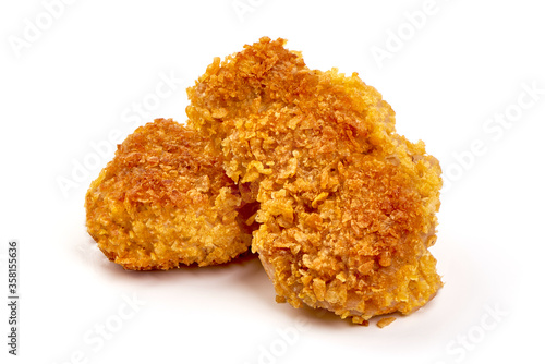 Crispy chicken fillet in breadcrumbs, isolated on white background