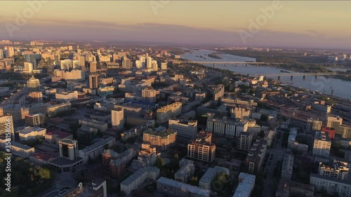 Wallpaper Mural Aerial video of a beautiful peaceful evening city on the river. Industrial areas of the city. Residential district. Residential-type city. Evening panorama of the metropolis. 4K Torontodigital.ca