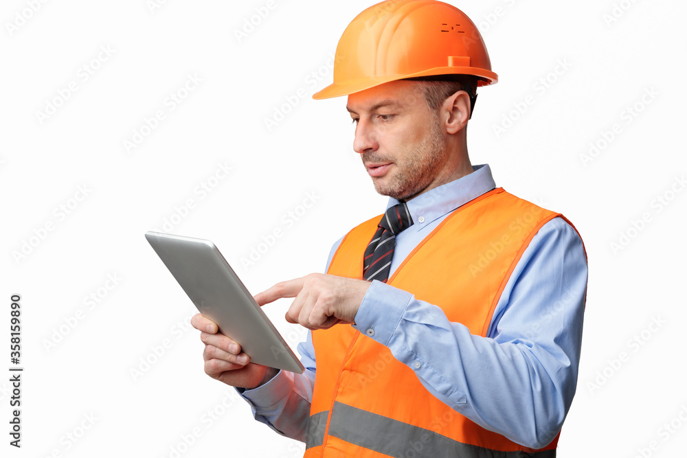 Building Engineer Using Digital Tablet Computer, Studio Shot Building Engineer Using Digital Tablet Computer, Studio Shot