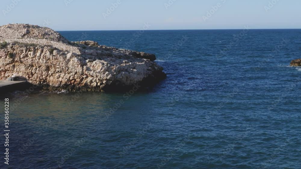 Polignano a mare, Italy, many tourists enjoy the outdoors after the quarantine from covid-19. Even fishermen resume sport fishing in the sea Polignano a mare, Italy, many tourists enjoy the outdoors after the quarantine from covid-19. Even fishermen resume sport fishing in the sea