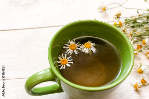 Chamomile Tea On Wooden Table Still Life