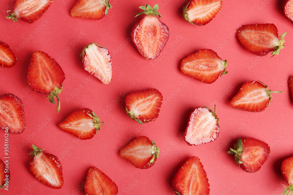 Tasty ripe strawberries on red background, flat lay