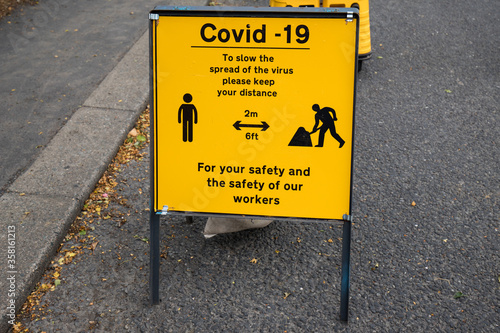 Covid-19 information sign to help protect workers against coronavirus pandemic.