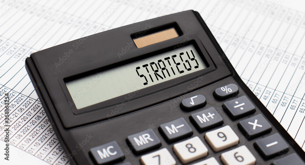 A calculator with the word strategy on the display A calculator with the word strategy on the display