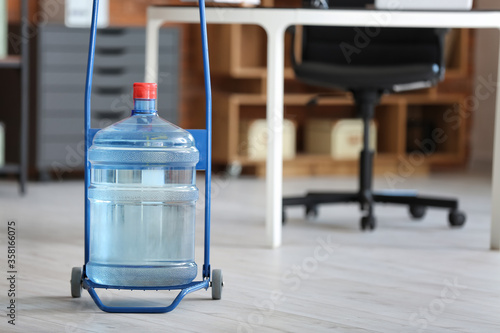 Cart with bottle of fresh w...