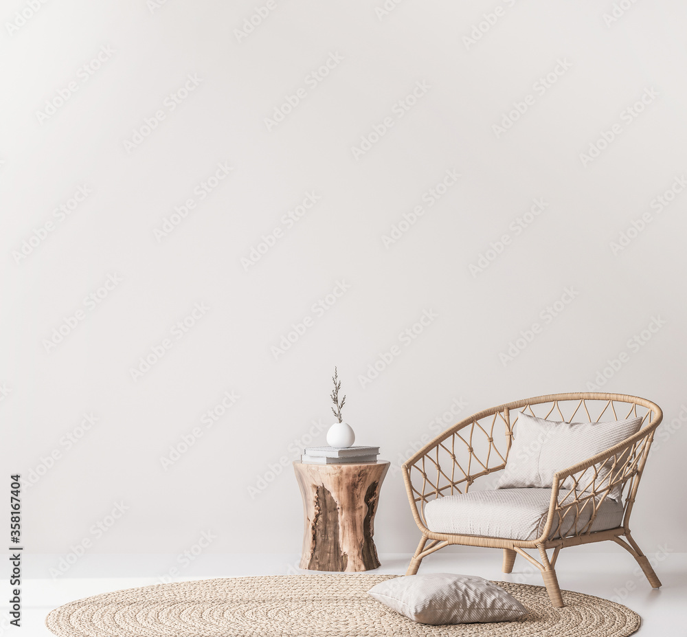 Mock up wall in Scandinavian living room design, home decor with rattan armchair and natural wooden table on empty bright background - obrazy, fototapety, plakaty 