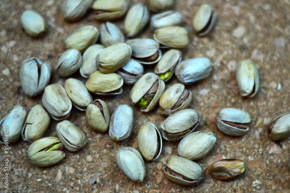 pistachios on wooden background