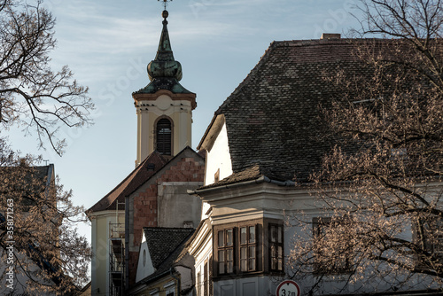 Old houses and Blagovestenska church bell tower at Szentendre, Hungary photo