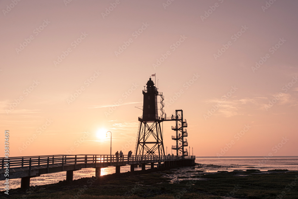 sunset over the Lighthouse Obereversand - Wurster Nordseeküste