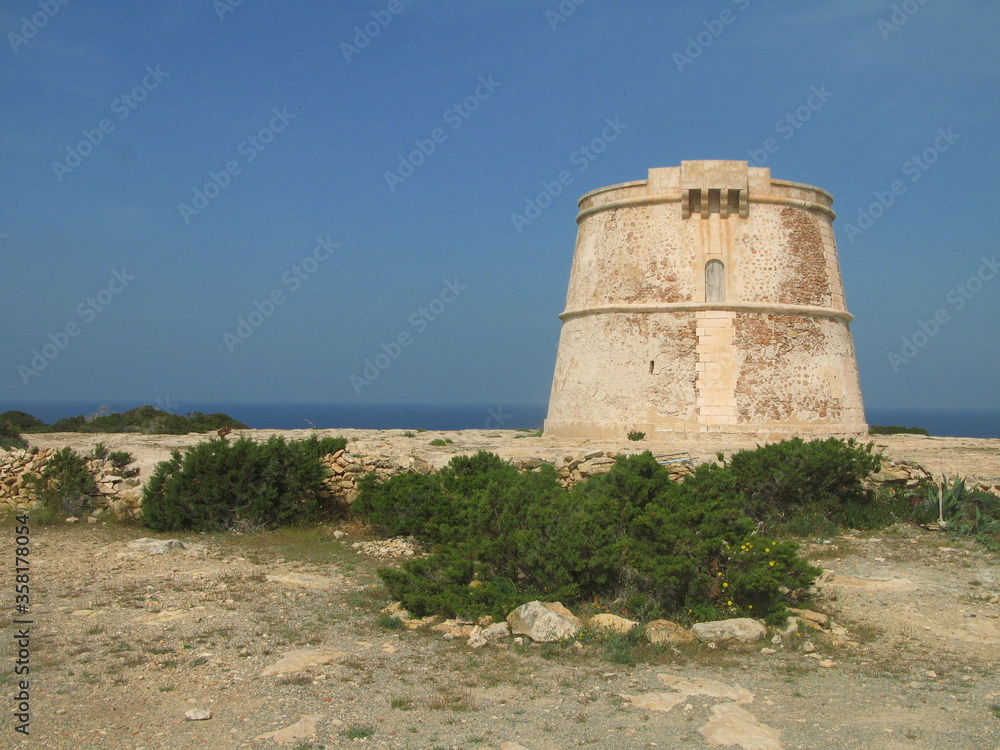 Defence tower at Punta Prima, Es Pujols, Formentera, Spain