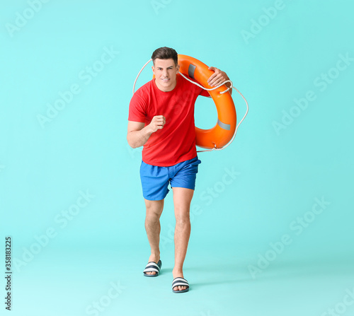 Running beach rescuer with ...