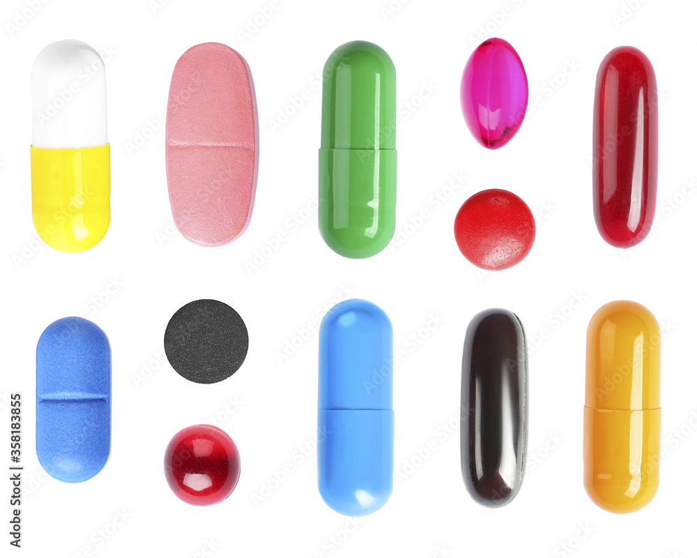 Set with colorful pills on white background, top view Set with colorful pills on white background, top view