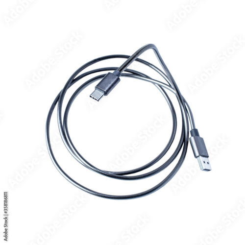 Usb chrome black and white cable isolated on white background. Top view
