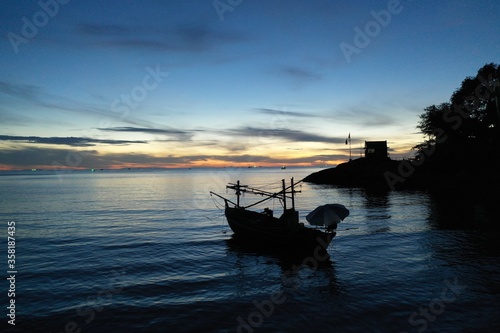 Fishing boat as the sunrises