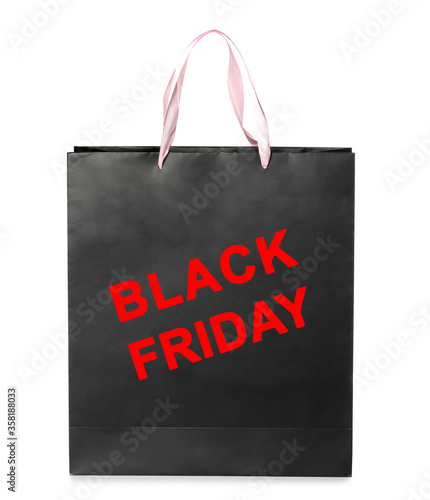 Paper shopping bag with phrase BLACK FRIDAY on white background