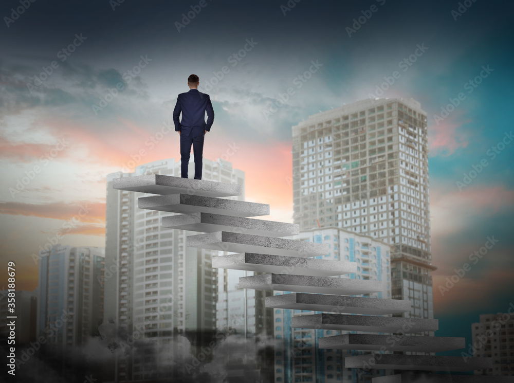 Man standing on top of stairs and looking at cityscape. Way to success Man standing on top of stairs and looking at cityscape. Way to success