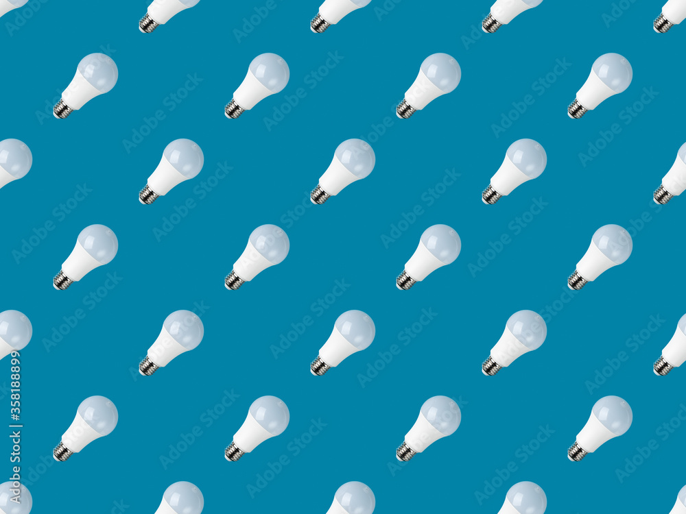 electric led light bulb seamless pattern over blue background. backdrop texture. electric led light bulb seamless pattern over blue background. backdrop texture.