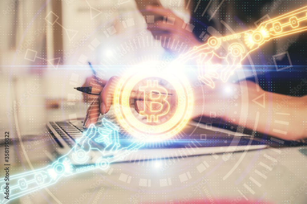 Double exposure of woman hands typing on computer and crypto market theme hologram drawing. Blockchain concept. Double exposure of woman hands typing on computer and crypto market theme hologram drawing. Blockchain concept.