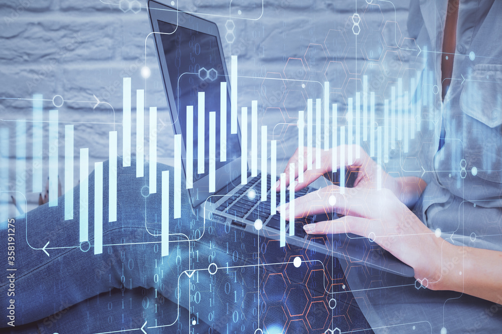 Multi exposure of woman hands typing on computer and forex chart hologram drawing. Stock market analysis concept. Multi exposure of woman hands typing on computer and forex chart hologram drawing. Stock market analysis concept.