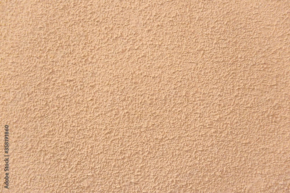 Orange plaster wall background texture Orange plaster wall background texture