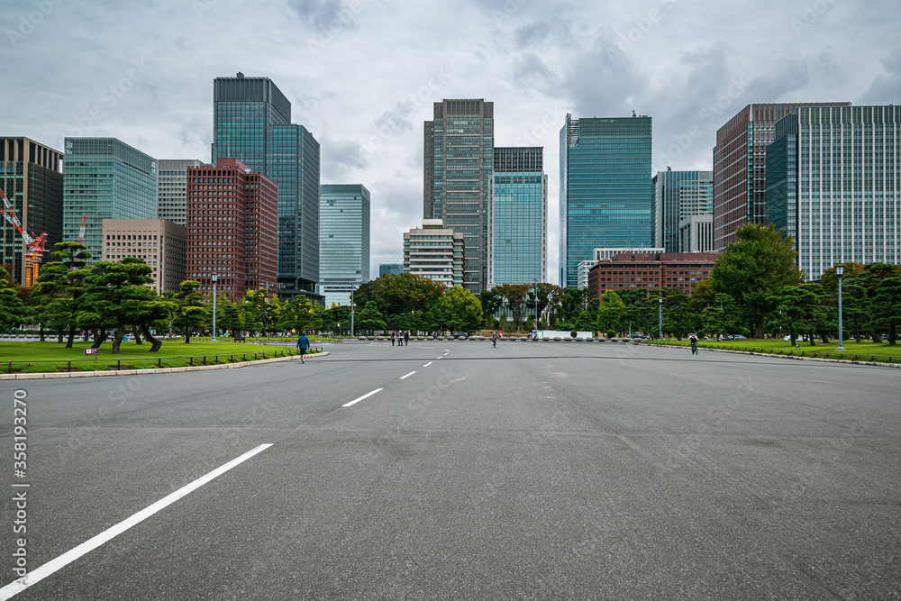 Cityscape of Chiyoda district in Tokyo, Japan on an overcast day. Scenic Tokyo skyline on a cloudy day. Cityscape of Chiyoda district in Tokyo, Japan on an overcast day. Scenic Tokyo skyline on a cloudy day.