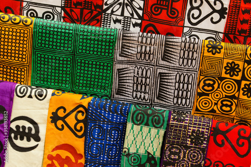 Traditional West African fabric for sale at a market in Ntonso, Ghana, West Africa photo