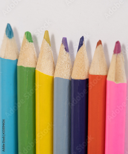 colored pencils on white background