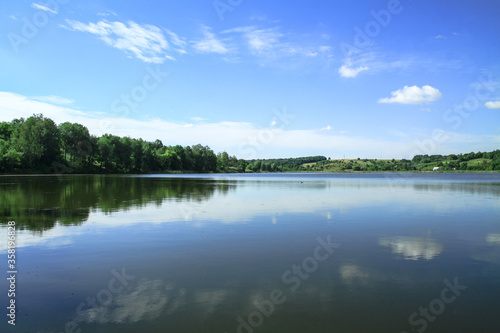 Beautiful river in a pretty area in Siberia. Landscape in Canada with a cold lake. Stock photo background. © subjob