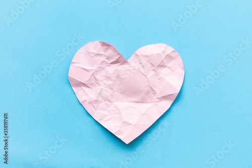 Wallpaper Mural Pink Paper Heart Beat shape on blue background. Torontodigital.ca