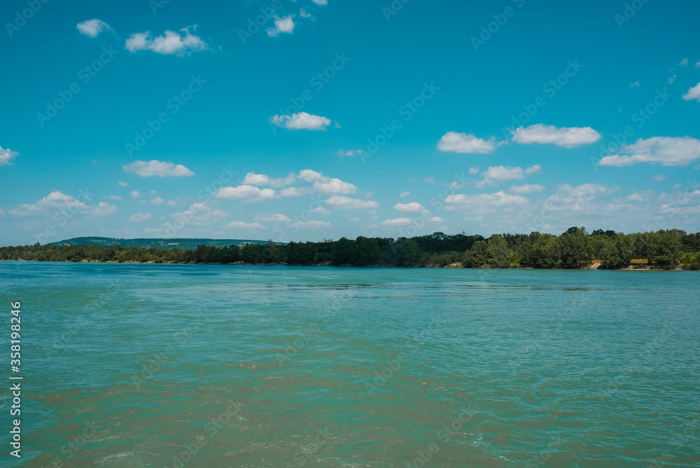 Photo of a seashore in the distance.