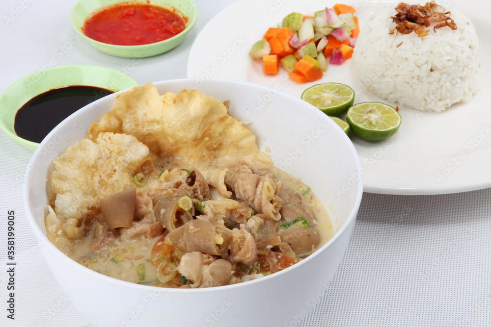 sop kambing or goat soup with hot sauce is from betawi jakarta
indonesian traditional food sop kambing or goat soup with hot sauce is from betawi jakarta
indonesian traditional food