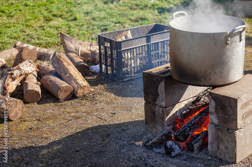 The boiler on the fire. Cooking on an open fire.  photo