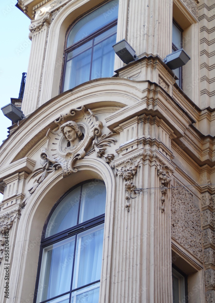 Detail of the facade of an old house in St. Petersburg Detail of the facade of an old house in St. Petersburg