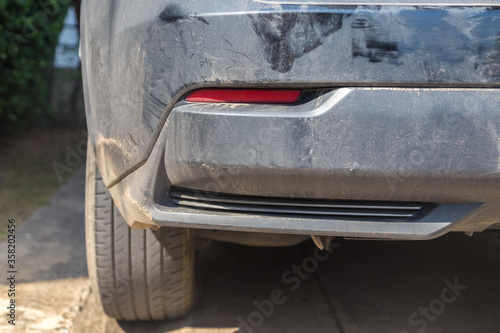 rear view of a car with dust