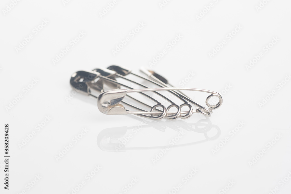 Set of pins isolated over white background Set of pins isolated over white background