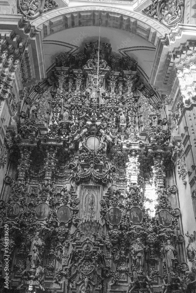 Taxco, Mexico - May 2013
Inside Santa Prisca cathedral, there are nine floor-to-ceiling altarpieces, all covered in gold. Main altarpiece is dedicated to patron saints, Santa Prisca and San Sebastian