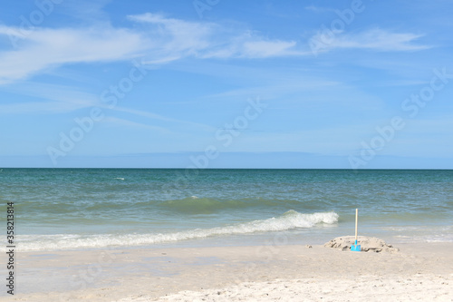 Fototapeta Naklejka Na Ścianę i Meble -  toy shovel on a beach-scape